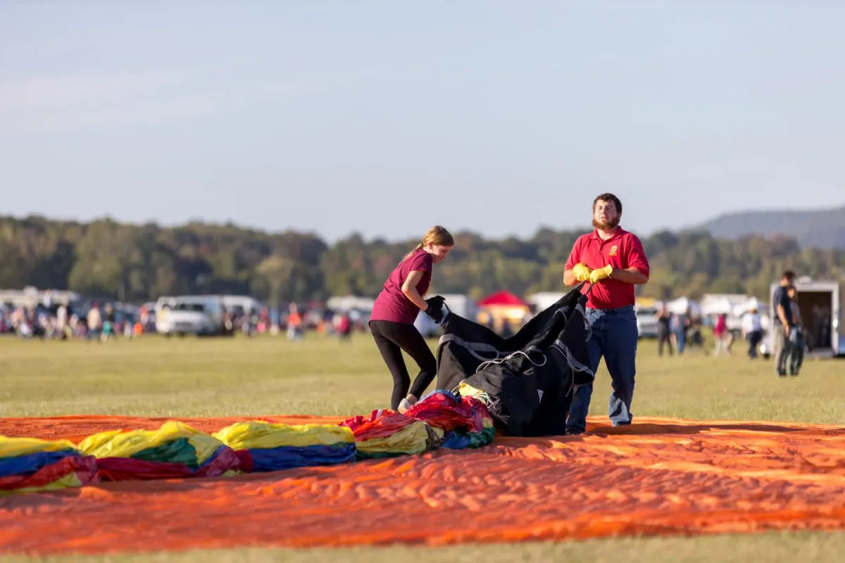 Balloon being filled with air from a large fan