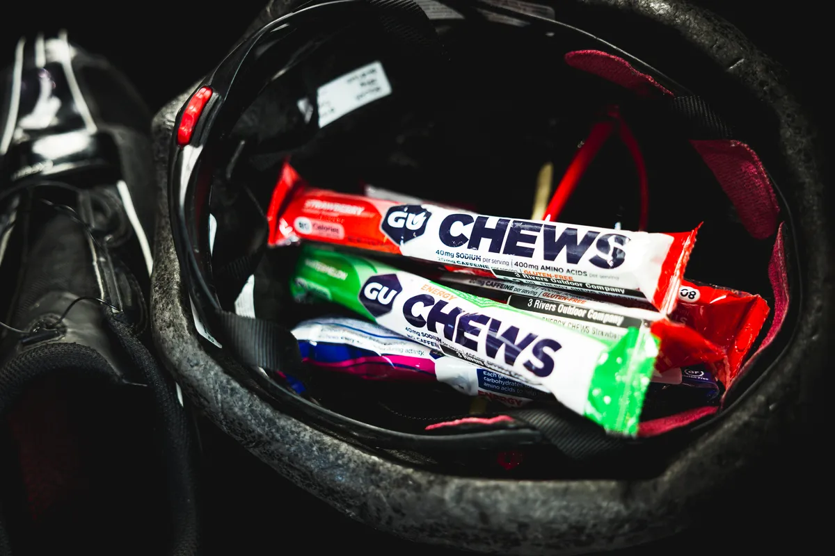 GU Chews packets in a cycling helmet
