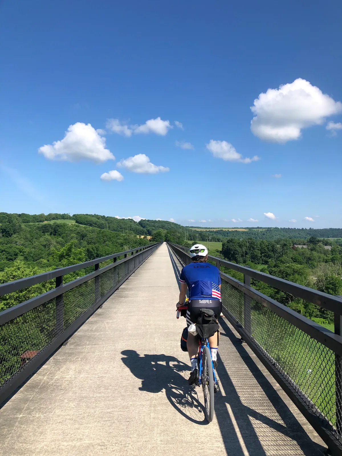 Dan riding across the long, straight deck of the Salisbury Viaduct, valley below