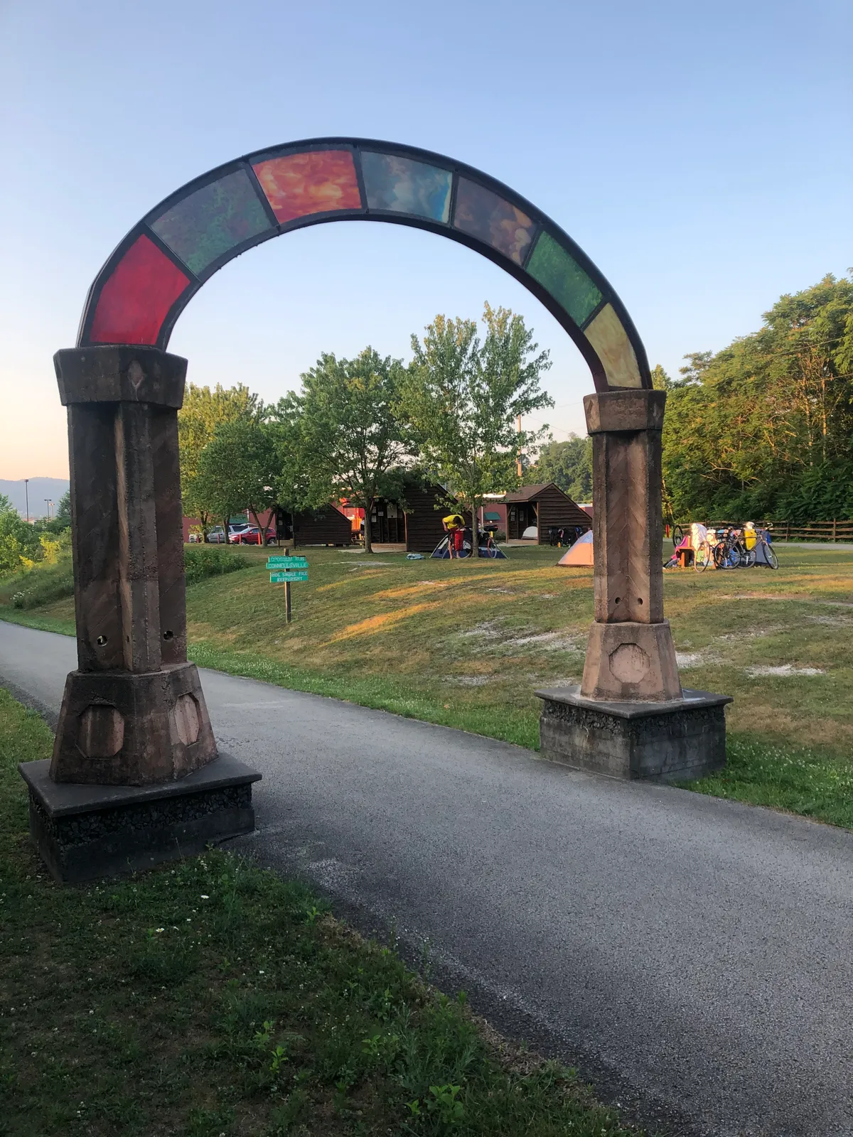 Decorative arch at the Stewart's Crossing campground entrance by the trail in Connellsville