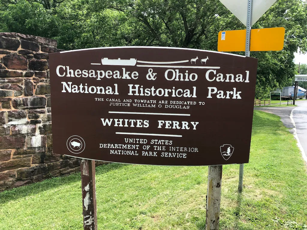 Brown Chesapeake & Ohio Canal National Historical Park sign for Whites Ferry
