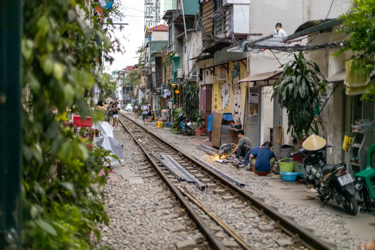 Locals working on a remodel on the tracks
