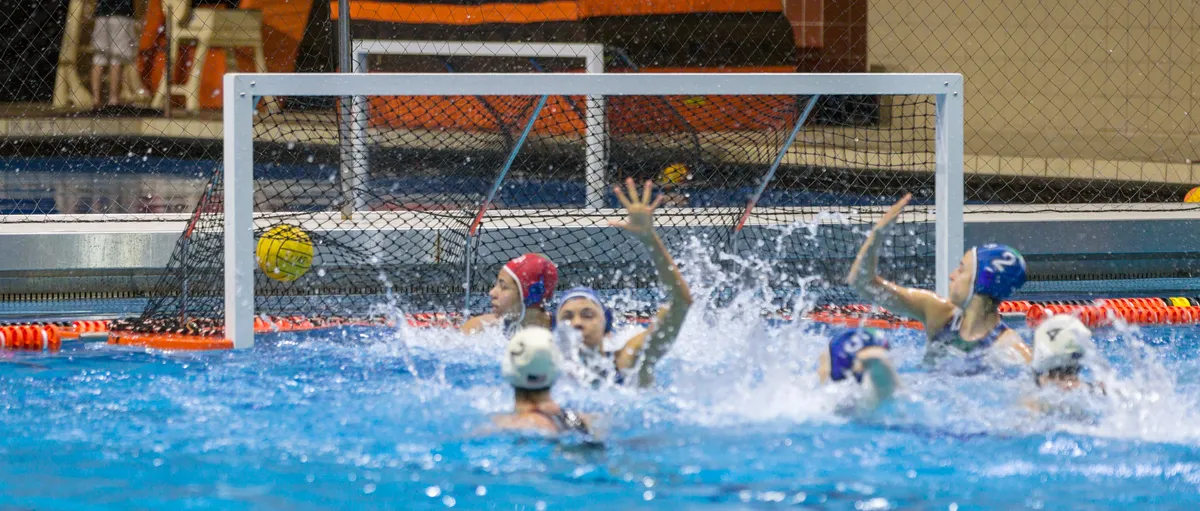 Ball sailing past the Italian goalkeeper toward the left post